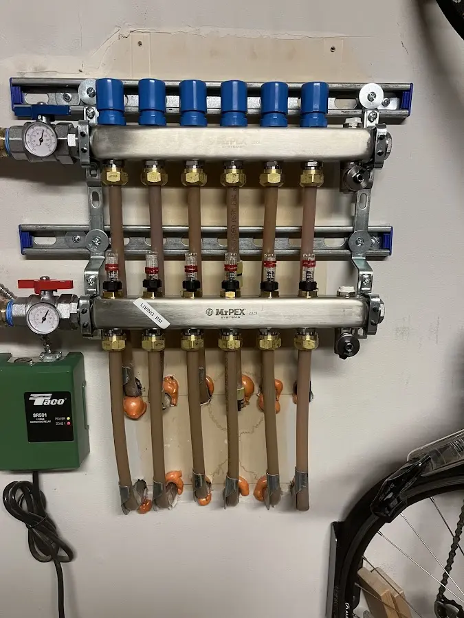 Plumber performing Gas Line Installation at a residential property in Farmville